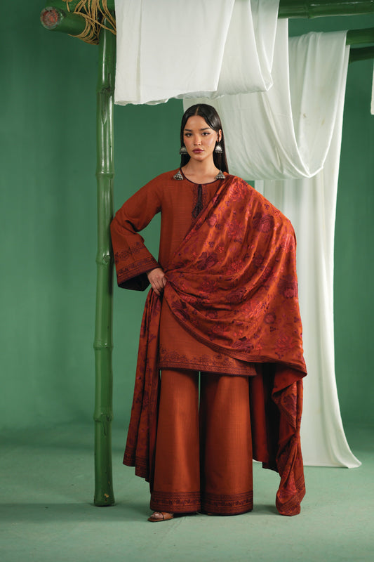 Rustick, a rust khaddar suit by Jahaan